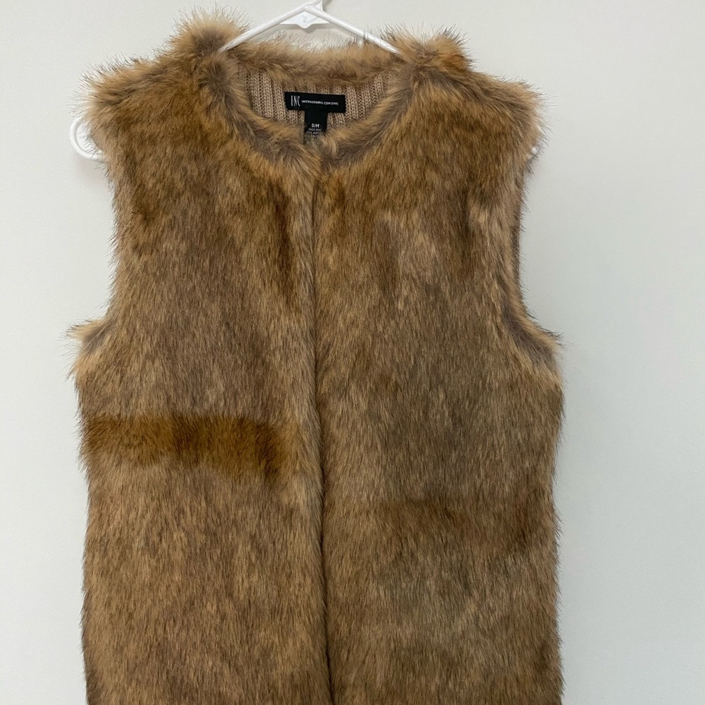 Never worn women’s INC faux fur vest